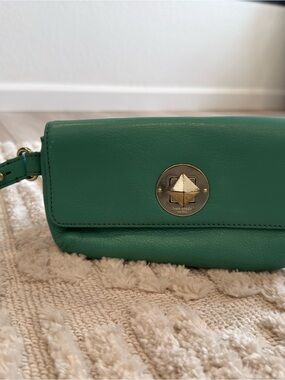 kate spade teal leather wristlet with gold turnlock
